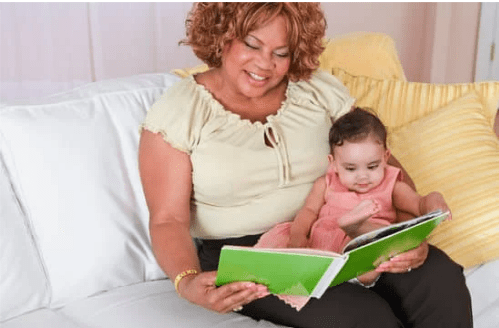 In the Babies Rock initiative, volunteers rock babies, play with and read to them.